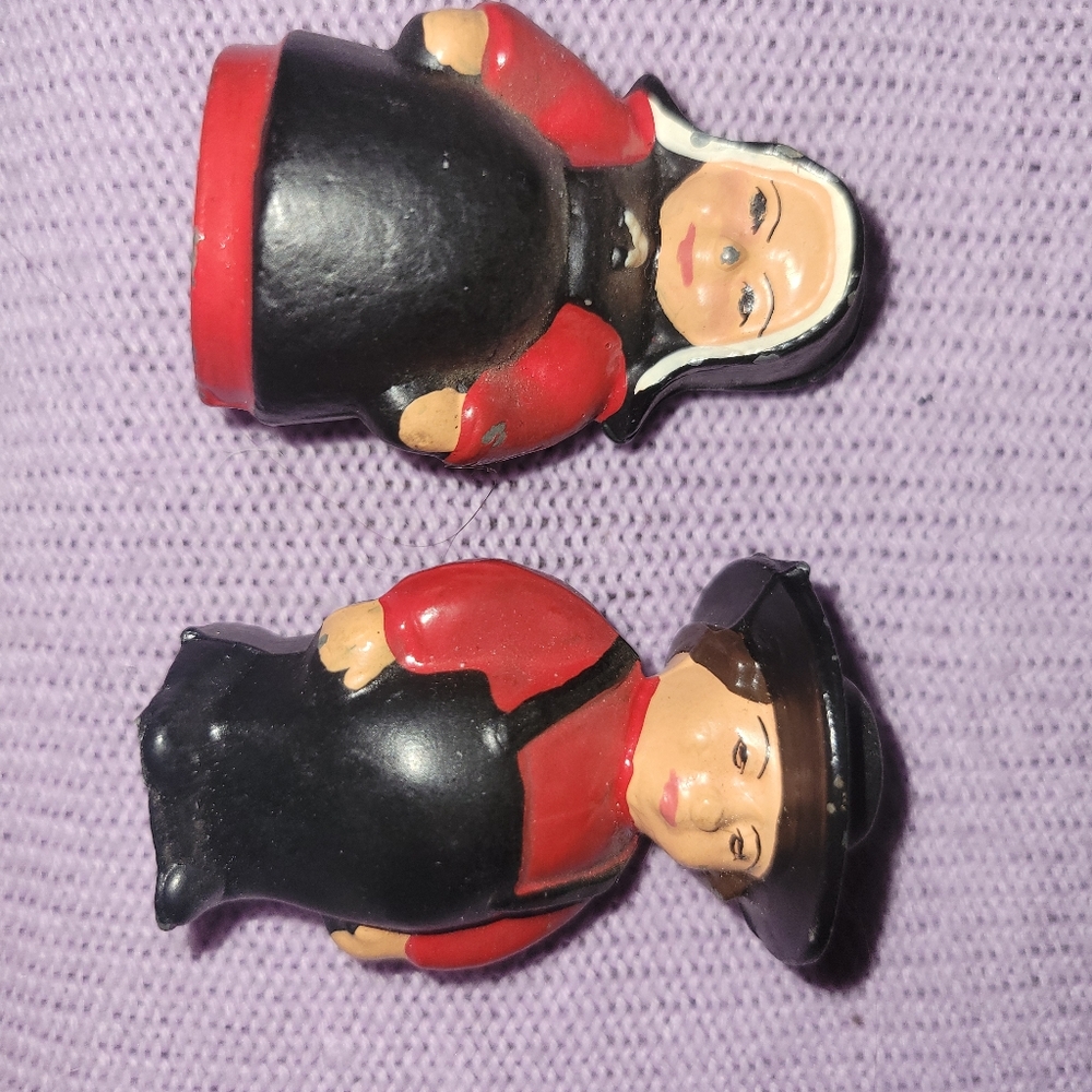 Vintage cast iron salt and pepper shakers. Man And Women